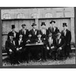 Group at opening of Hebrew Men of England Synagogue, Spadina Ave., Toronto, 1921. Ontario Jewish Archives, Blankenstein Family Heritage Centre, item 1903.|This item is a group photograph taken at the opening of the Hebrew Men of England Synagogue on Spadina Avenue. It features members of the synagogue seated in the backyard wearing top hats and tails. Rabbi Jacob Gordon is pictured in the first row, third from the left.